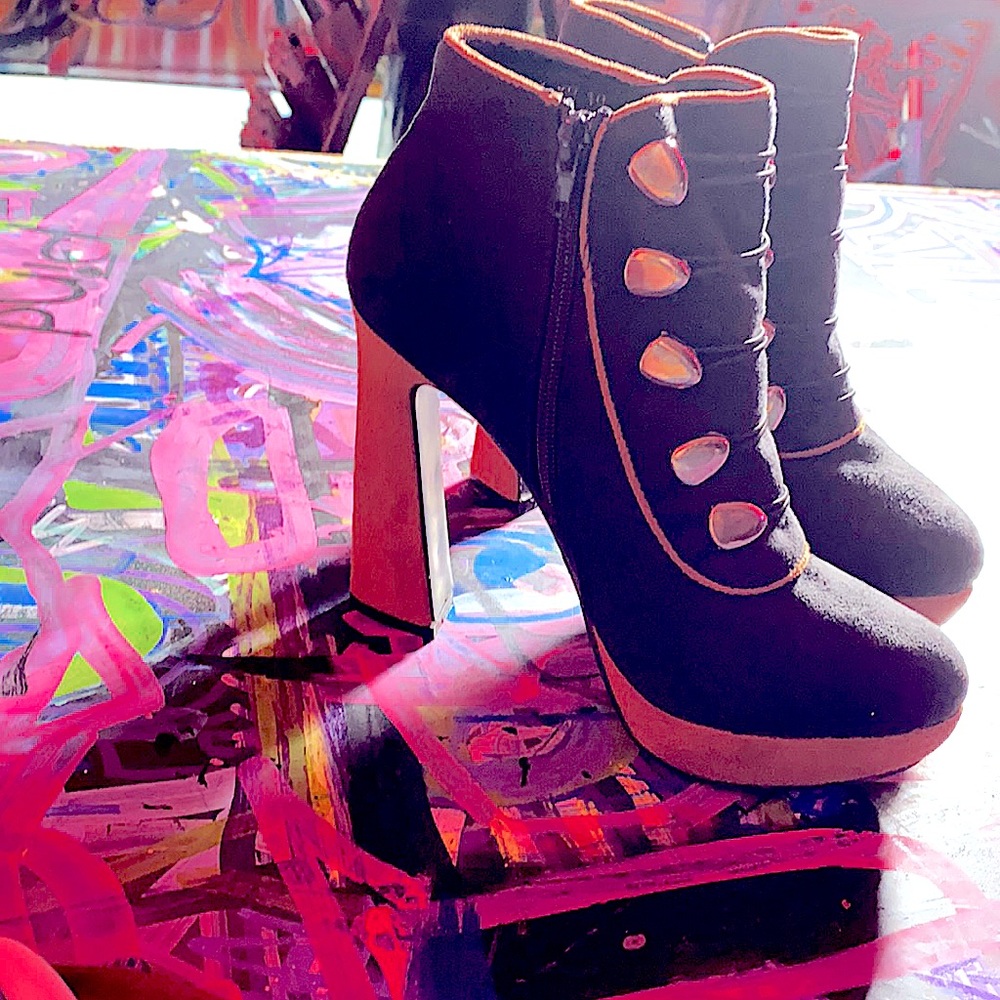 Black and brown chunky heeled bootie.